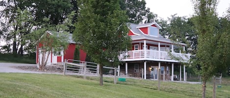 South side of the house, with the hot tub peeking around right the corner