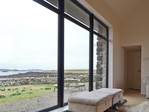 Living room with stunning views overlooking Loch Varkasaig | Greep, Roag, Isle of Skye