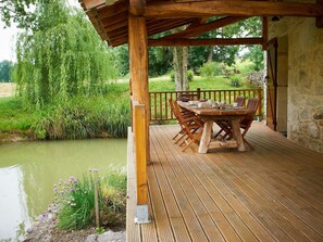 Property, Natural Landscape, Tree, Room, Wood, House, Deck, Real Estate, Porch, Building