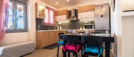 Kitchen with all modern amenities and dining room.	Hide photo list
