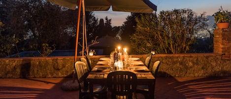 Dining out at Simple Farmhouse with shared pool