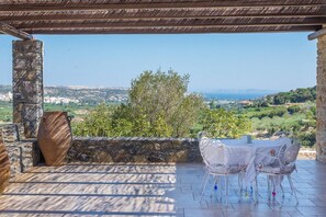 The terrace offers ample shaded space to enjoy your meal, to read or just relax while enjoying the far reaching views