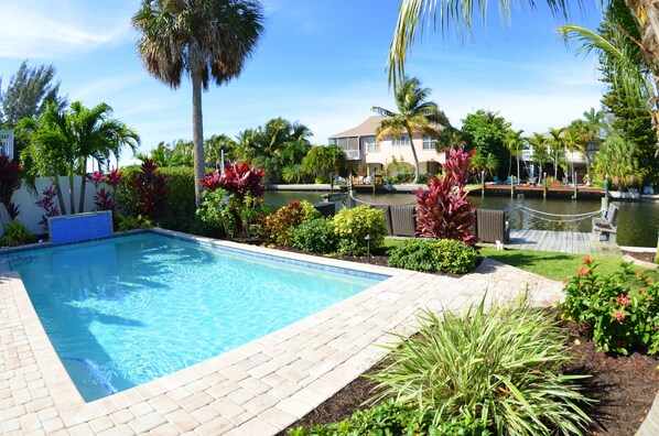 A heated pool and 30' private boat dock will accommodate the largest of yachts.