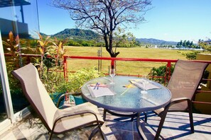 Condo Begonia private balcony - ocean & beach views, refreshing breezes.  