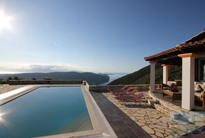 Large pool terrace with breathtaking views. (Cloudy pool due to rain/mud storm.)