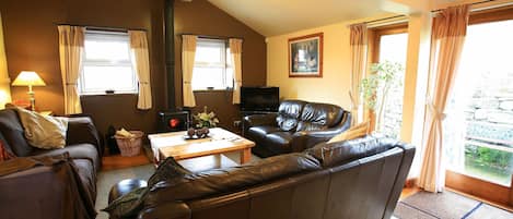 Spacious living room & french doors to garden