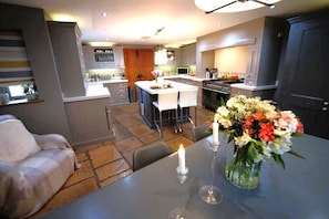 Kitchen with informal dining for ten people