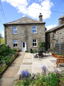 Traditional Dales Cottage Surrounded By Renowned Hay Meadows And Dry Stone Walls