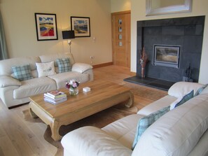 Another view of the main lounge and the wood burning stove