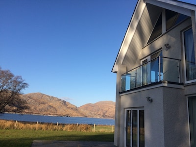 Luxury 5-bedroom architect-designed detached house, loch frontage, superb views