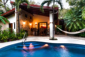 Pool & outside dining area with hammock.