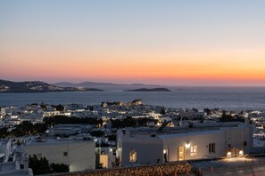 overlooking  the famous windmills and the picturesque old harbour