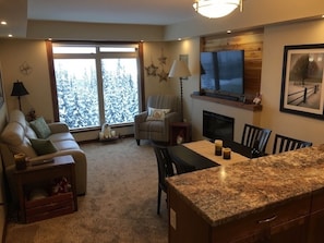 Living room with a southern view of the Monashee mountains.