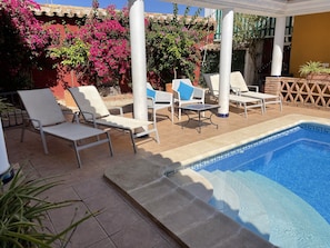 Pool steps allow easy access into the pool - or a place to sit when it gets hot!