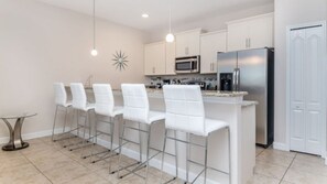 Kitchen with breakfast bar, seats 5 comfortably