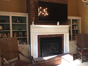Large tv that pulls down for easy viewing 