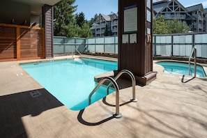 Common area with small plunge pool and hot tub