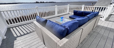 Enjoy the view from the large back deck and new outdoor sectional! 