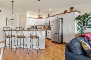 VP303: T's Retreat l Living Area and Kitchen