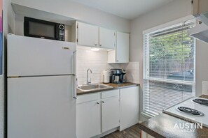 Fully equipped kitchen with all the essentials and microwave