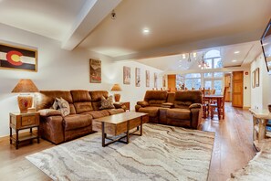 Open to kitchen and dining room
