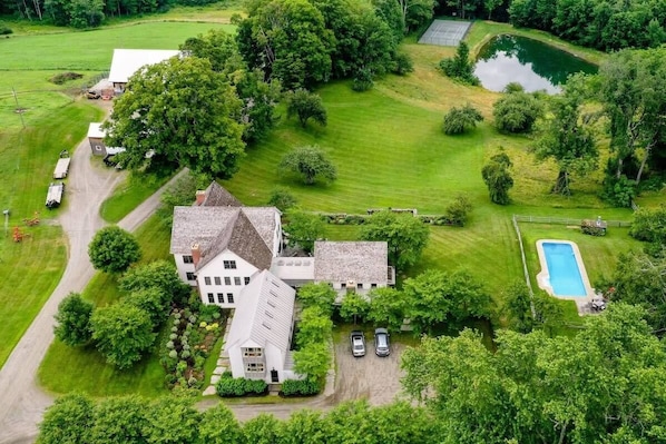 Feed your eyes with the beautiful aerial view of the farm estate.