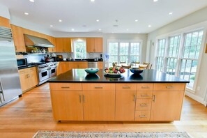 Walk around freely in this wide fully-stocked kitchen. You'll have everything you need to prepare that sumptuous meal.