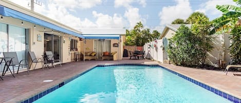 Purely Pompano! Spacious & sanitized 5BD/3BA luxury waterfront offering peaceful respite on ocean-access canal in Cypress Creek Community. Ideal for FL beach vacations, this one-story estate offers pool, patio/BBQ area, game room, fishing dock.