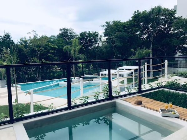 Private pool with spectacular view to the infinity pools and the lake