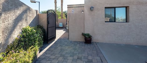 Entrance to rental private courtyard and door to rental apartment