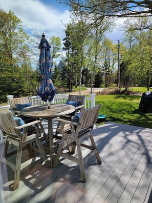 Here is an alternate view of the backyard and spacious deck.