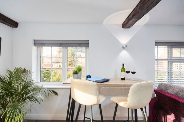 Versatile seating area with views over mature gardens
