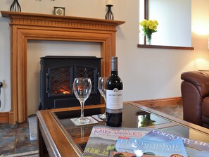 Relax in front of the electric woodburner in the welcoming living room | Chalgrove - Ffinnant, Soar, near Brecon