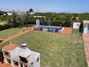 enclosed garden and pool