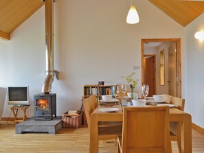 The large dining table easily seats six people for mealtimes with a view | West Bothy at Cluain Ghrianach, Laga, near Acharacle