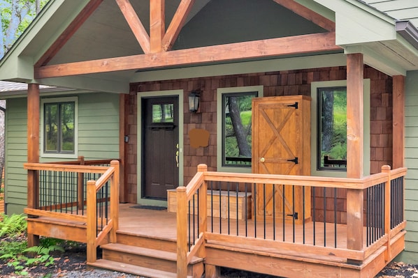 Ski locker and ski boot locker on front porch