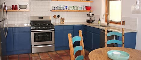 Fully stocked. Granite counters.  Floating shelves recessed dimmable light