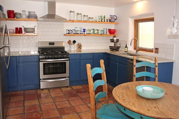 Fully stocked. Granite counters.  Floating shelves recessed dimmable light