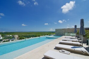 The best rooftop area in Puerto Cancun.
• Pool 
• Whirlpool 
• Seating
VIEWS!!!!