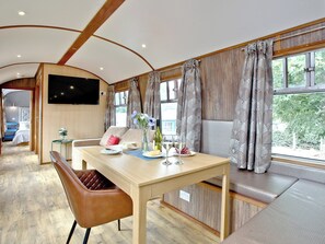 Quaint dining area | Brunel Boutique Railway Carriage No 1 - Brunel Boutique Railway Carriages, Dawlish Warren