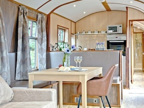 Quaint dining area | Brunel Boutique Railway Carriage No 1 - Brunel Boutique Railway Carriages, Dawlish Warren