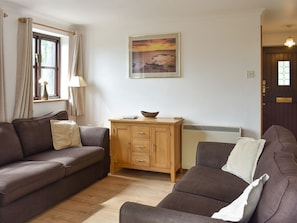 Comfortable seating within living area | Prince Croft Cottage - Mount Hawke Holiday Bungalows, Mount Hawke, near Redruth