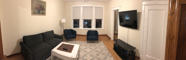 Panoramic view of Living room with 50 inch flatscreen TV!