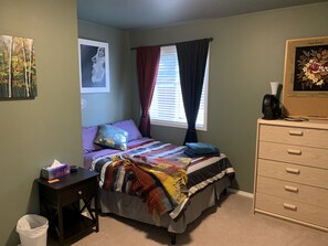Twin bedroom, also contains books and games
