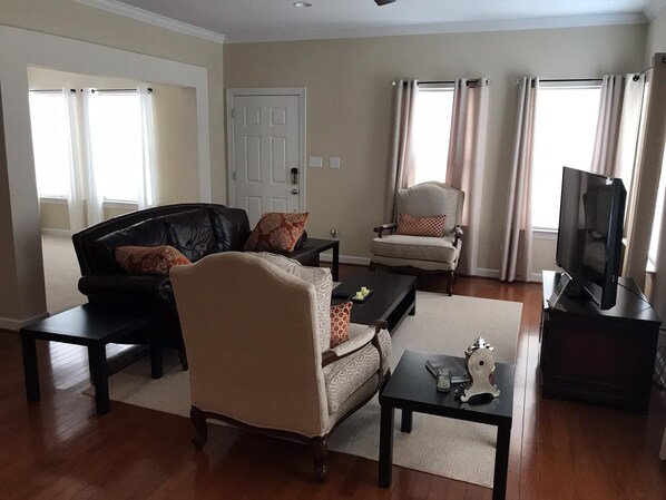 Relax and enjoy the living room with lots of natural  light