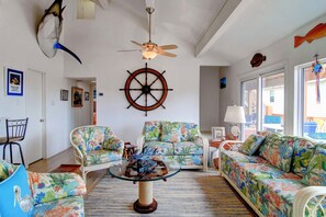 Indoor - Living area with nautical and tropical themes!