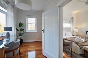 Floorboards throughout apartment