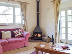 Warming wood burner | Cothi Cottage - Upton Hall Cottages, Nantgaredig, near Llandeilo