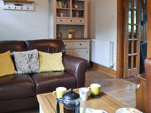 Cosy living room with wood burner | Bwthyn Pabi, Penmachno, near Betws-Y-Coed