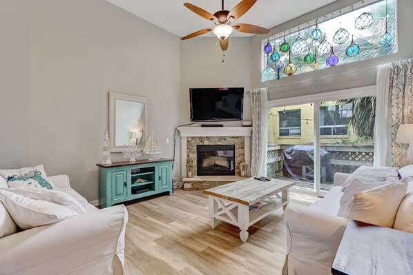 Spacious Living Room with Patio off the back and Electric Fireplace